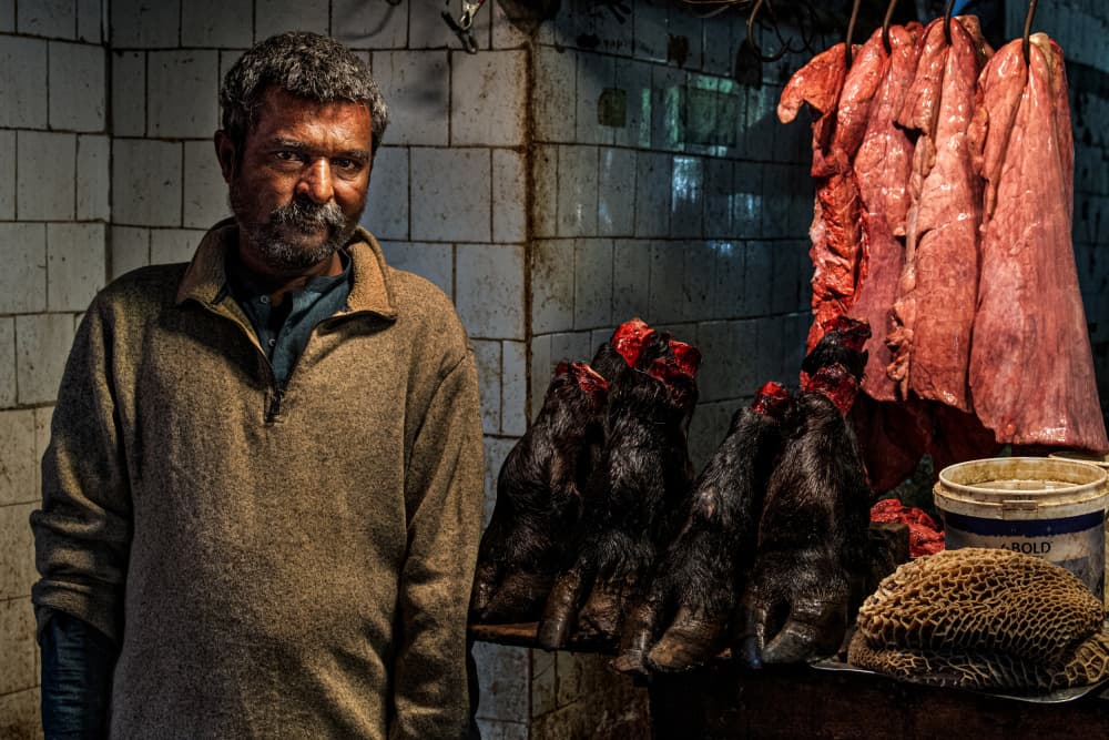 Market Butcher's Gaze by Joxe Inazio Kuesta Garmendia — canvas wall art