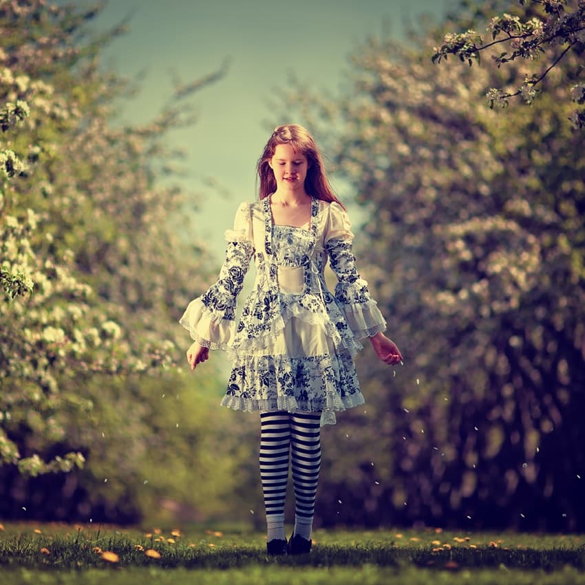 Girl in Spring Blossoms by Dmitry Frizel — canvas wall art