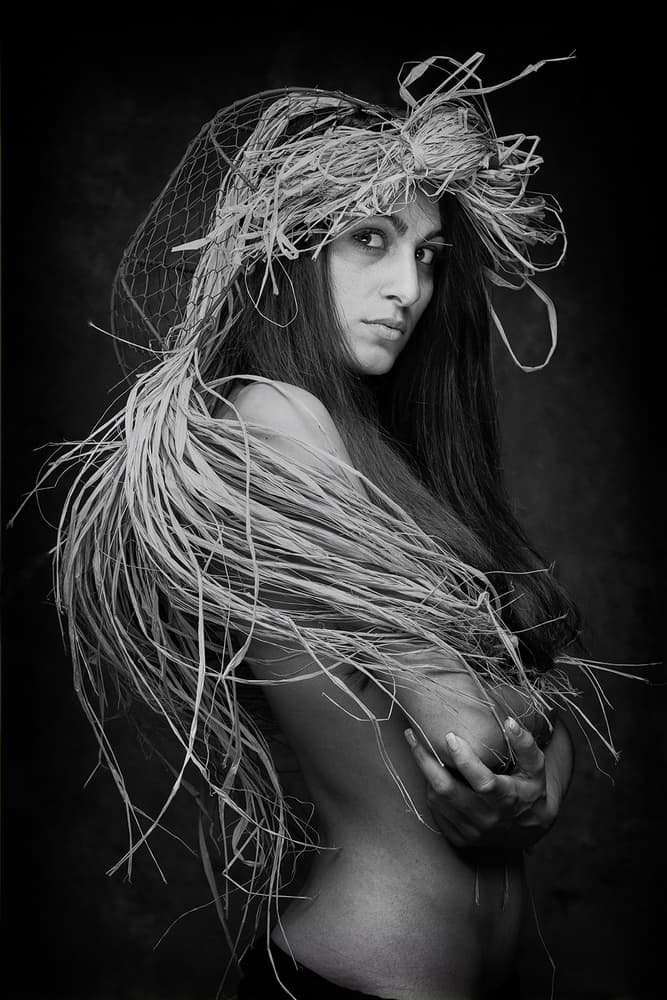 Woman In Straw Veil by Joan Gil Raga — canvas wall art