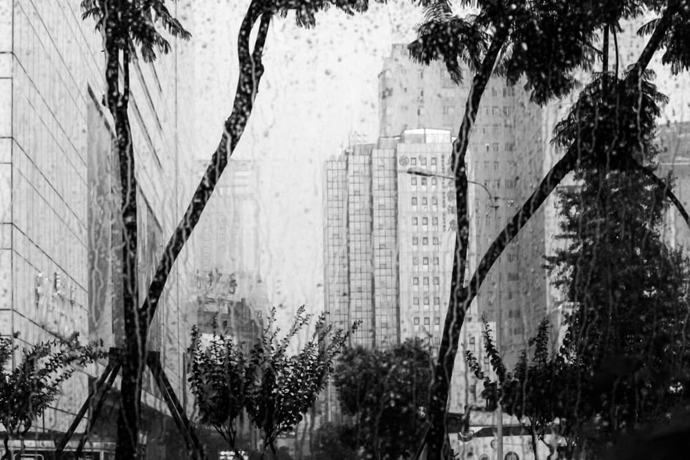 Rainy City View by Imaginative — canvas wall art