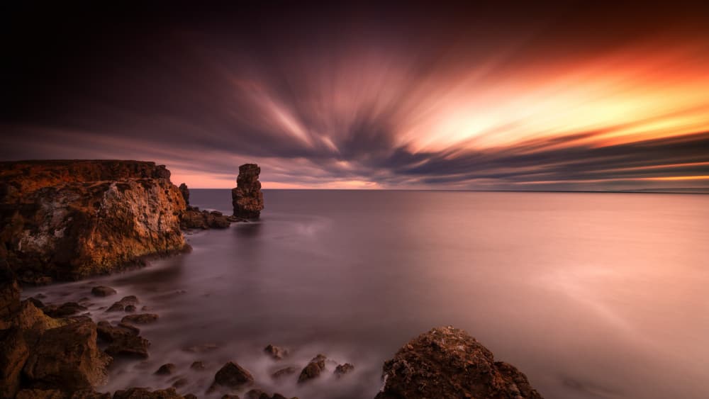 Dramatic Coastal Sunset by Gonçalo Capitão — canvas wall art