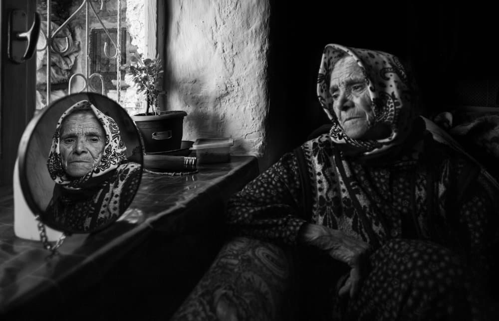 Elderly Woman Reflecting by durmusceylan — canvas wall art