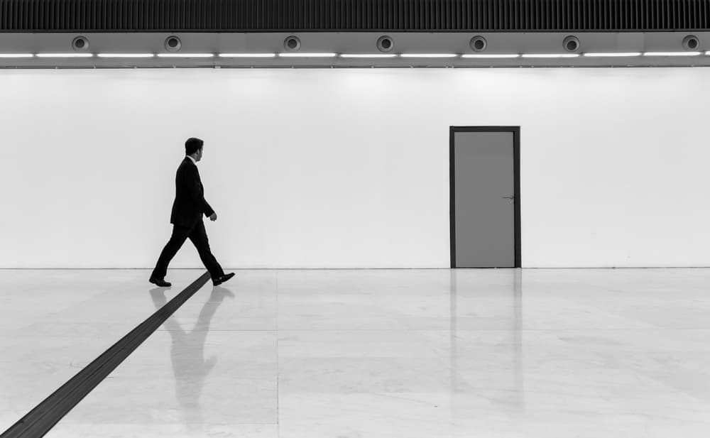 Man Walks Minimalist Hall by João Castro — canvas wall art