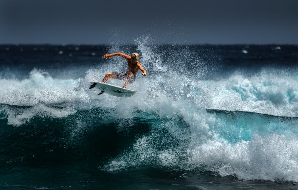 Surfer Catching Air Wave by Abbas Ali Amir — canvas wall art
