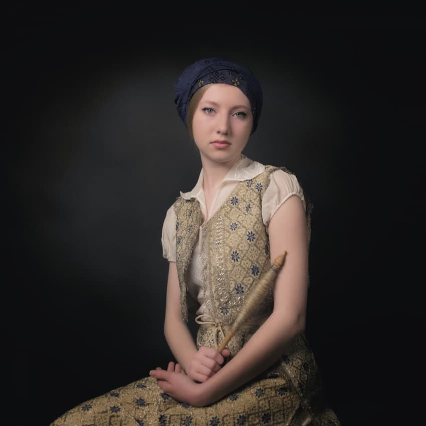 Young Woman Spinning Yarn by Alexandra Fira — canvas wall art
