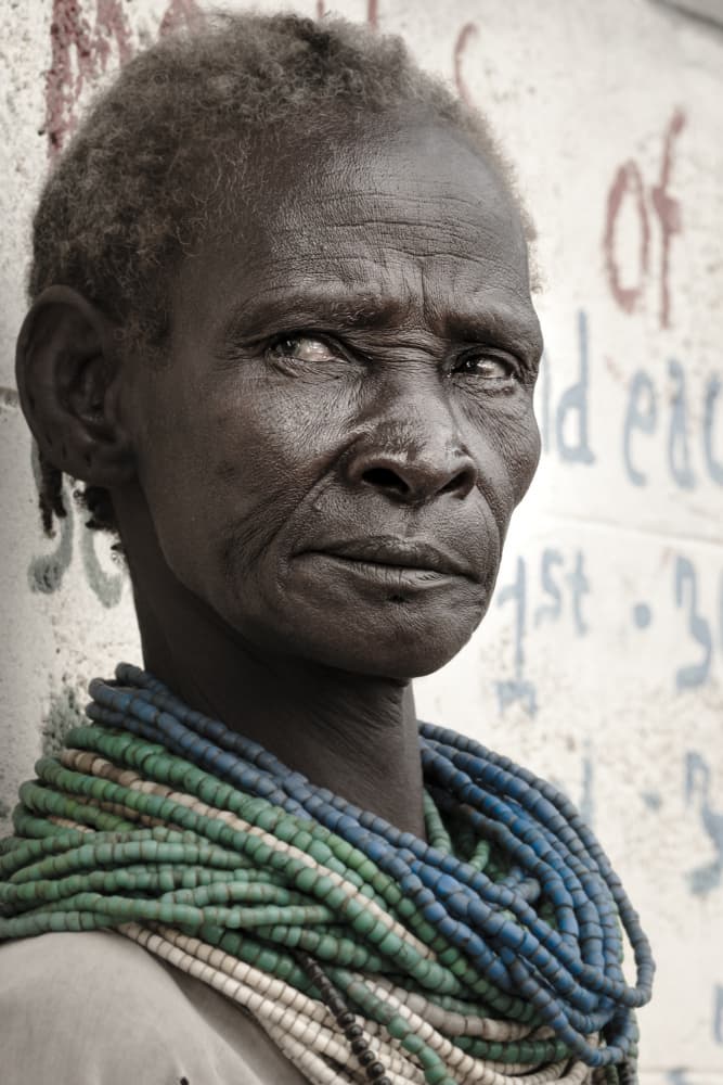 Contemplative African Woman by Elena Molina — canvas wall art