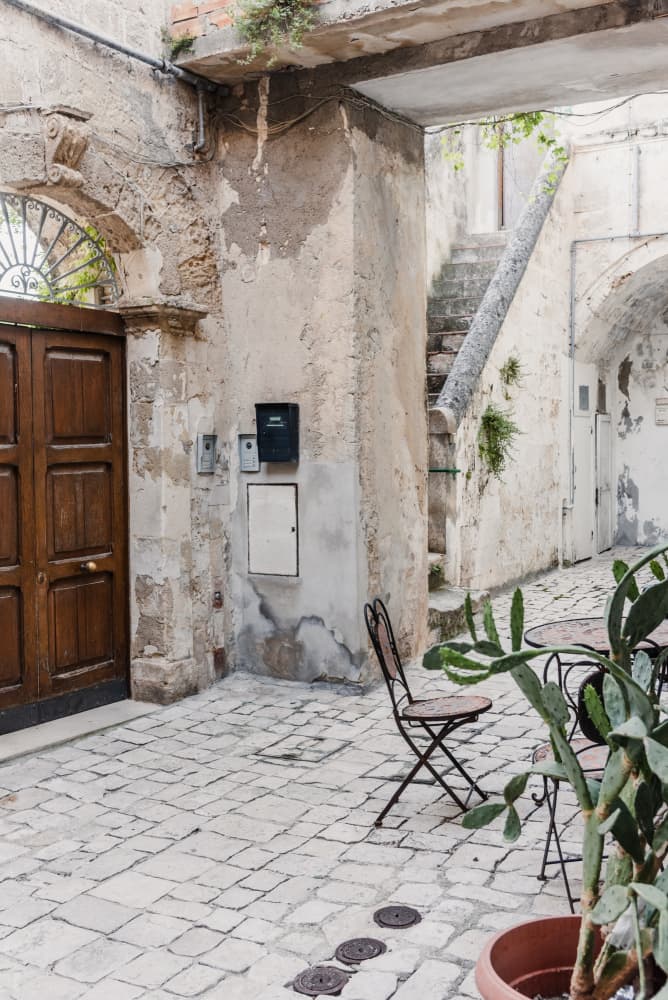 Quiet Mediterranean Courtyard by Photolovers — canvas wall art