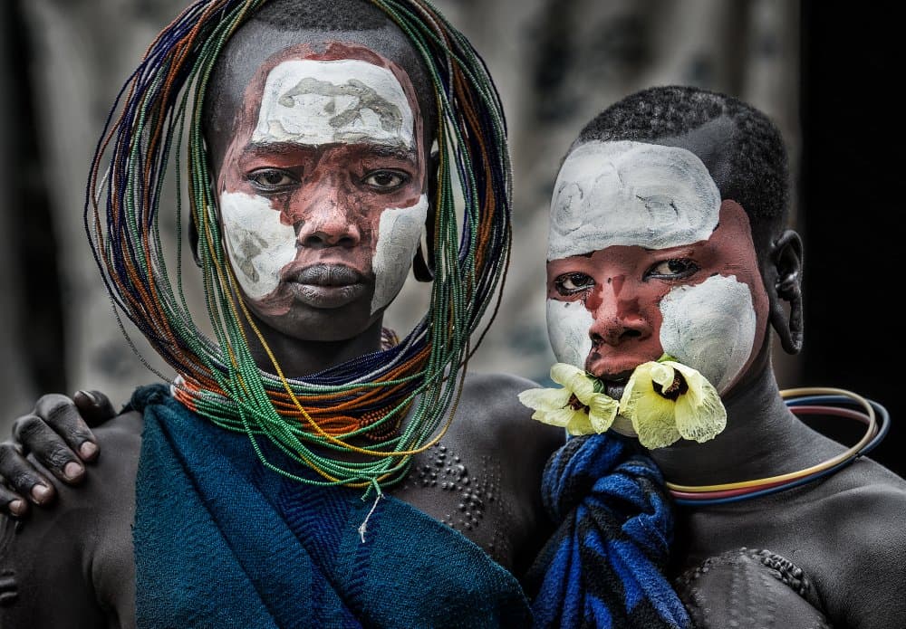Tribal Painted Faces by Joxe Inazio Kuesta Garmendia — canvas wall art