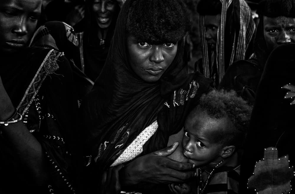 Soulful Mother And Child by Joxe Inazio Kuesta Garmendia — canvas wall art