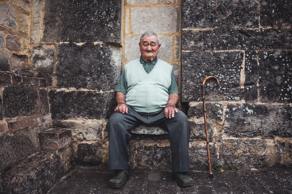 Peaceful Old Man Sitting by Marco Tagliarino — canvas wall art
