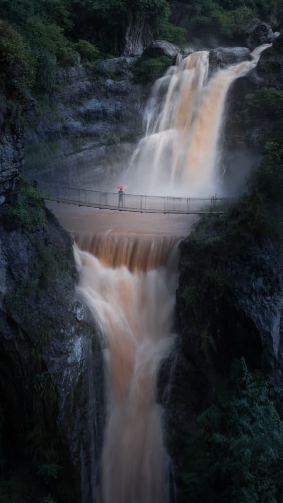 Pink Umbrella Waterfall Bridge by Simoon — canvas wall art