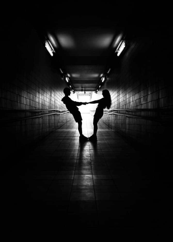 Couple In Dark Tunnel by Jorge Pimenta — canvas wall art
