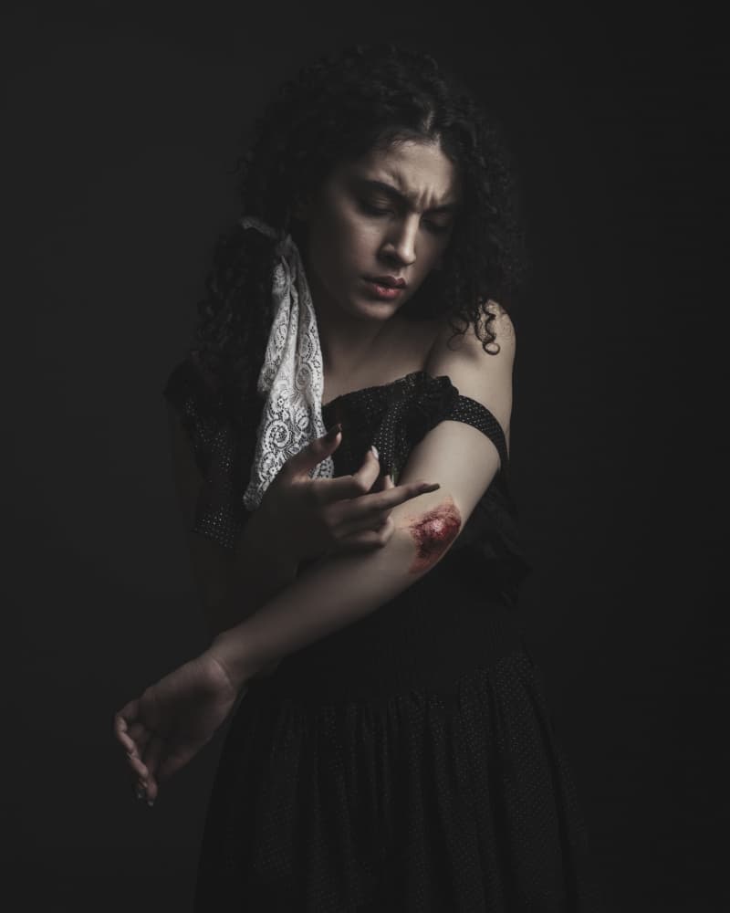 Woman's Somber Wound by Hooman Sedaghi — canvas wall art