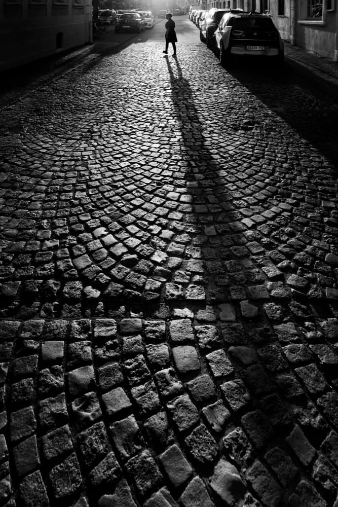 Long Shadow on Cobblestones by Eiji Yamamoto — canvas wall art