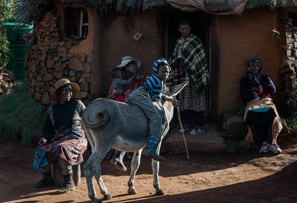 Rural Family and Donkey by Joxe Inazio Kuesta Garmendia — canvas wall art