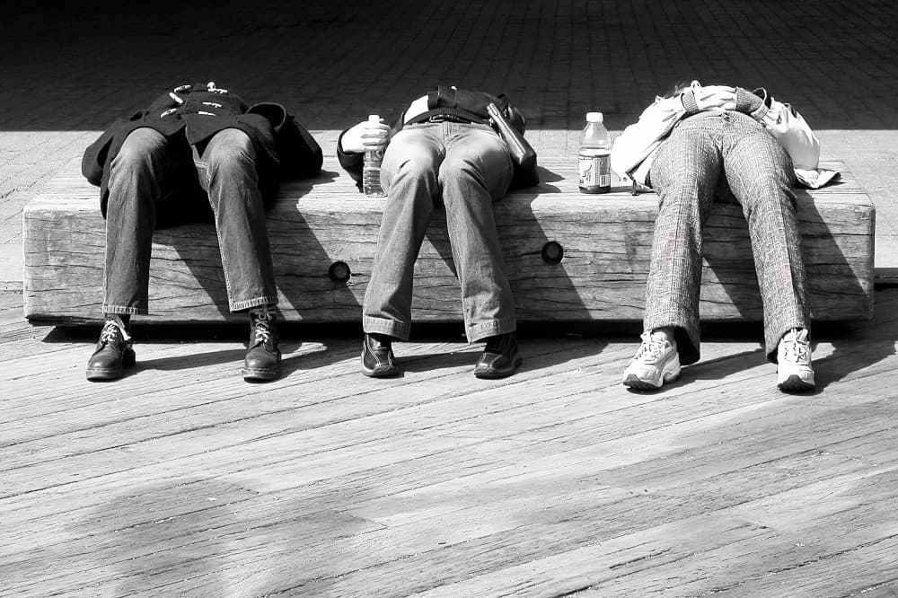 Urban Nap on a Bench by Michael Burlak — canvas wall art
