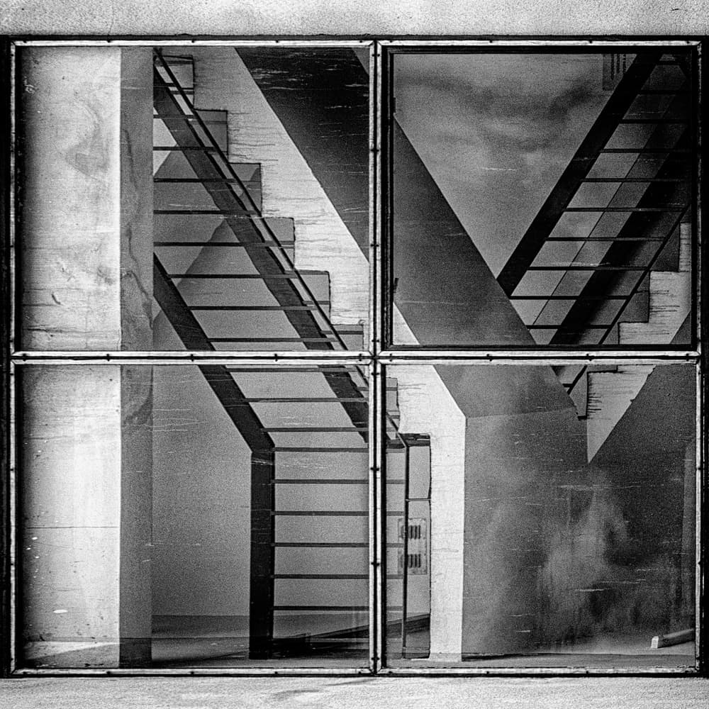 Geometric Stair Reflection by Karol Važan — canvas wall art