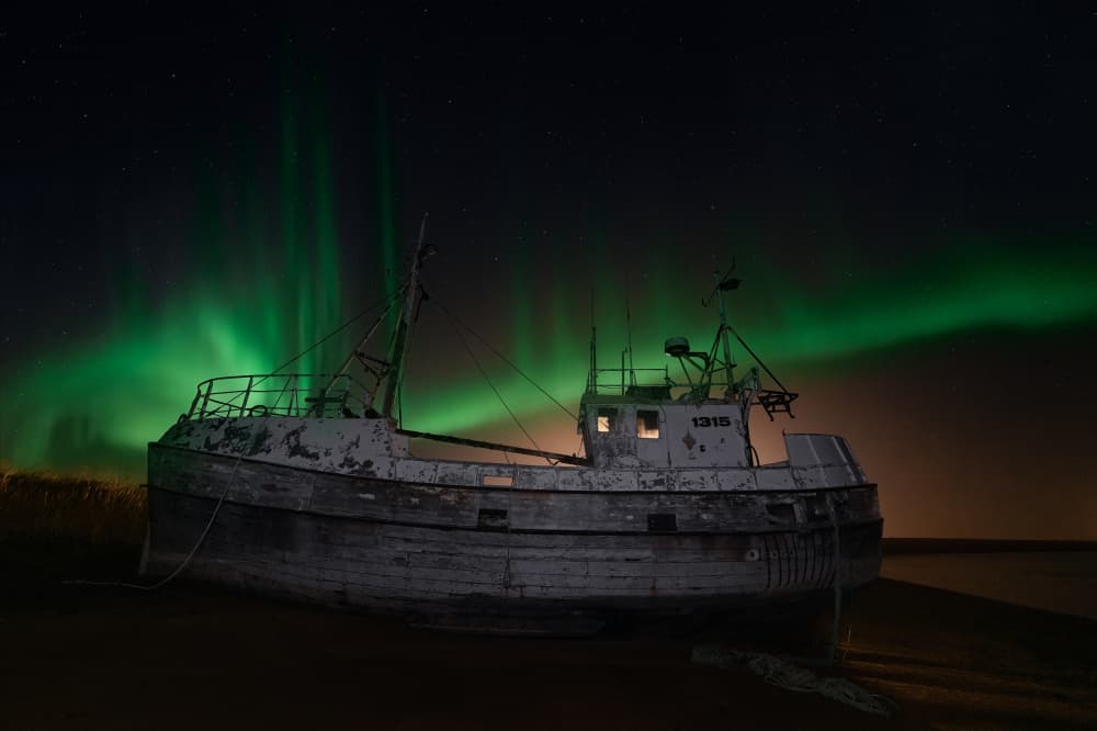 Shipwreck Northern Lights by Paco Jimenez — canvas wall art