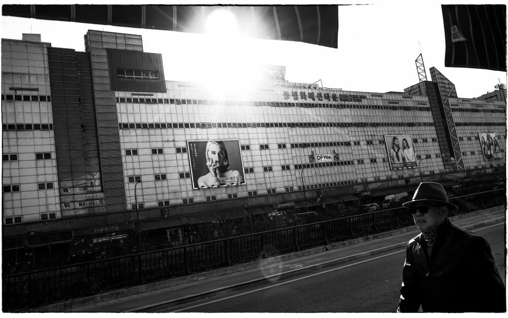 City Man Sun Flare by Parole Kim — canvas wall art