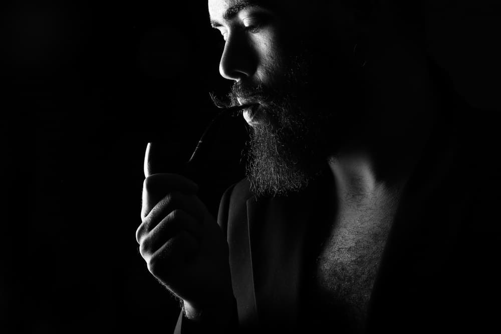 Contemplative Pipe Smoker by Paulo Medeiros — canvas wall art