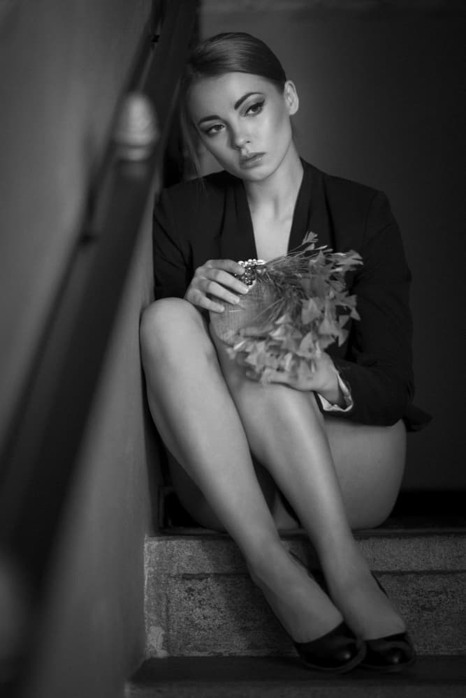 Pensive Woman on Stairs by Chris Bos — canvas wall art