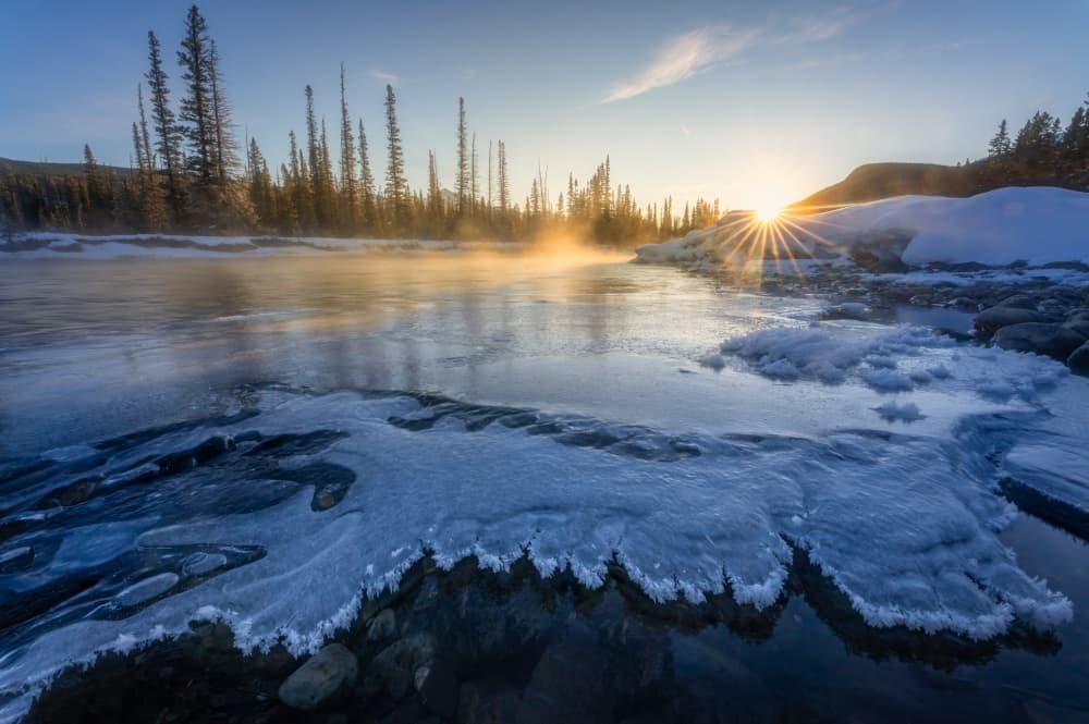 Frozen River Sunrise Glow by Yongnan Li (李永男) — canvas wall art