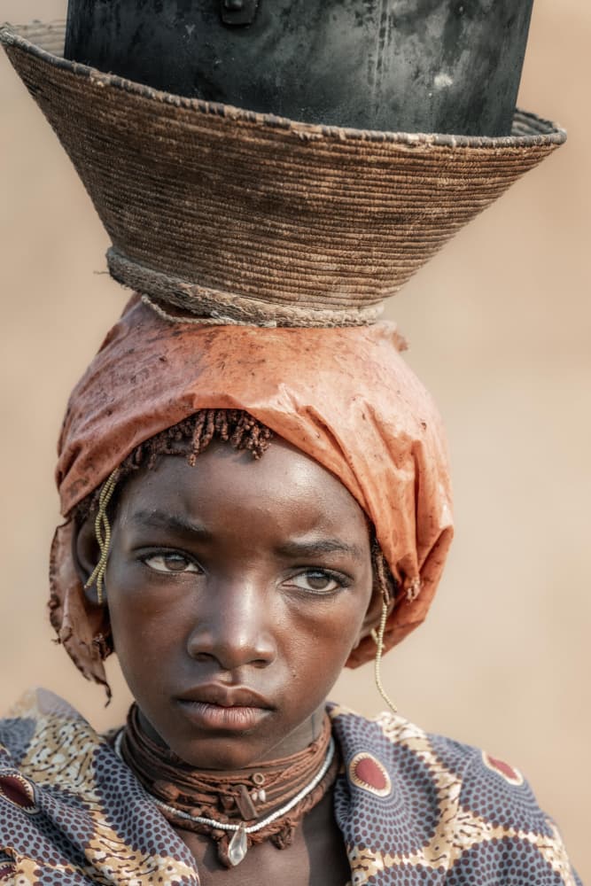 African Woman Carrying Pot by Trevor Cole — canvas wall art
