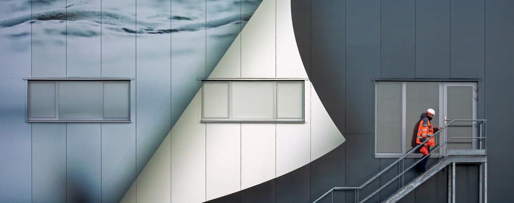 Worker on Peeling Facade by Lus Joosten — canvas wall art