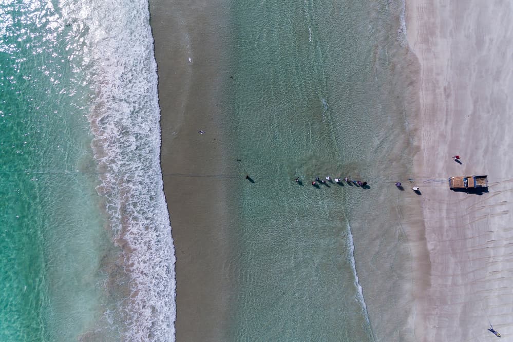 Coastal Fishing Scene by Haitham AL Farsi — canvas wall art