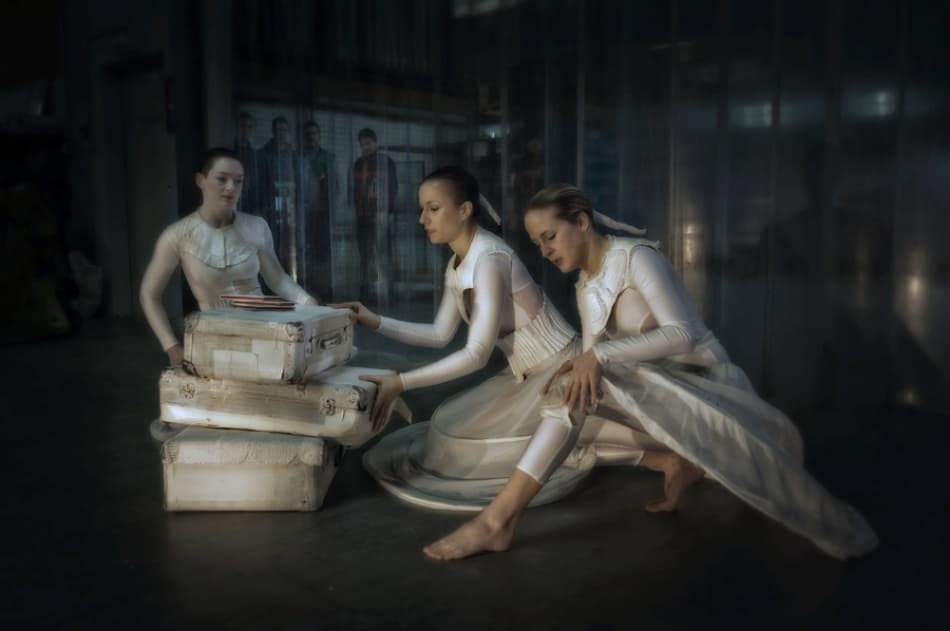 Quiet Dancers with Suitcases by Jure Kravanja — canvas wall art