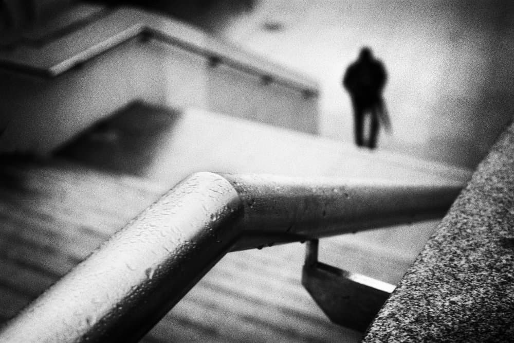Lone Figure on Wet Stairs by Paulo Abrantes — canvas wall art