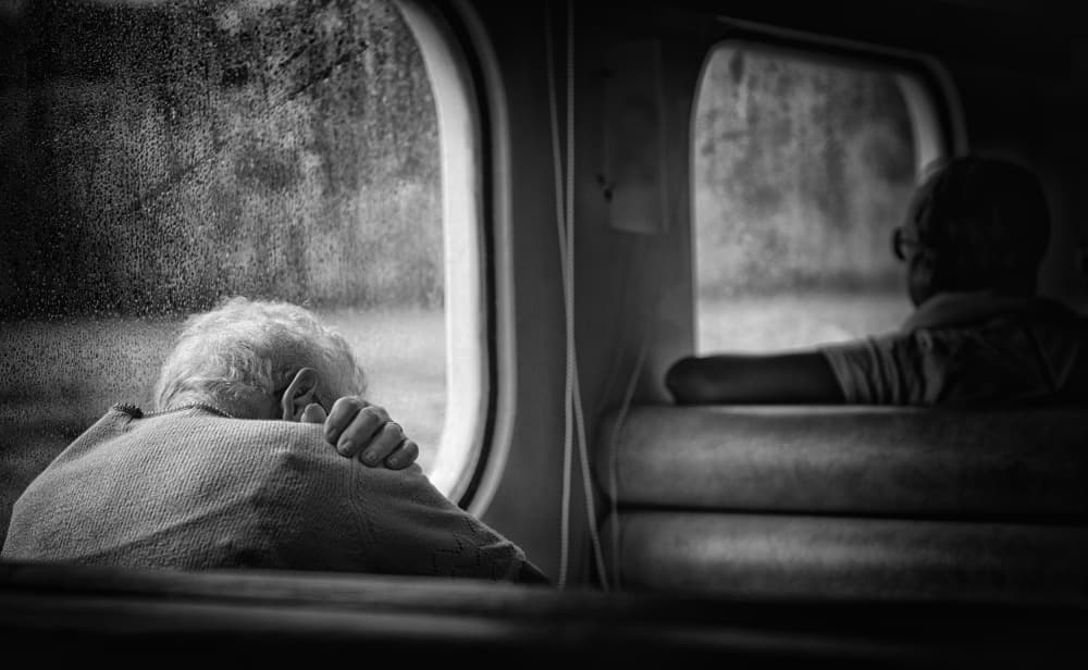 Elderly Couple Train Journey by Vito Guarino — canvas wall art