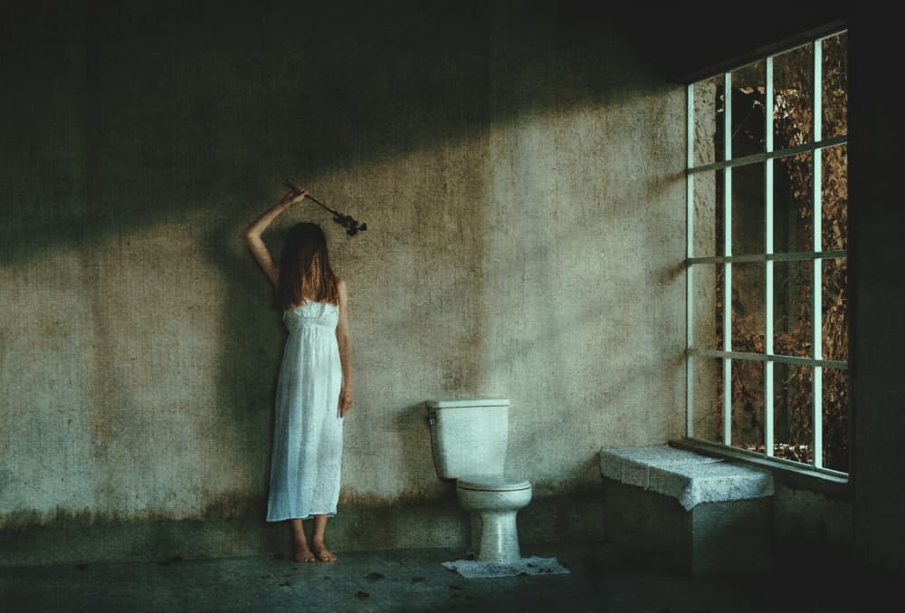 Solitary Woman Barred Window by Nick Amanda — canvas wall art