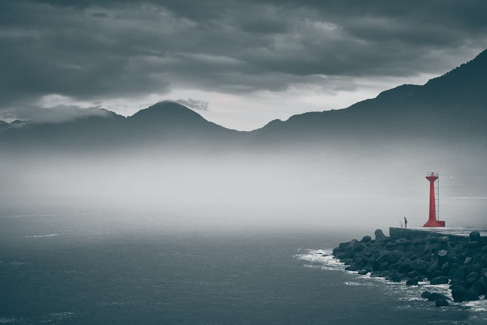 Red Lighthouse on Misty Coast by MingLun Tsai (蔡明倫) — canvas wall art