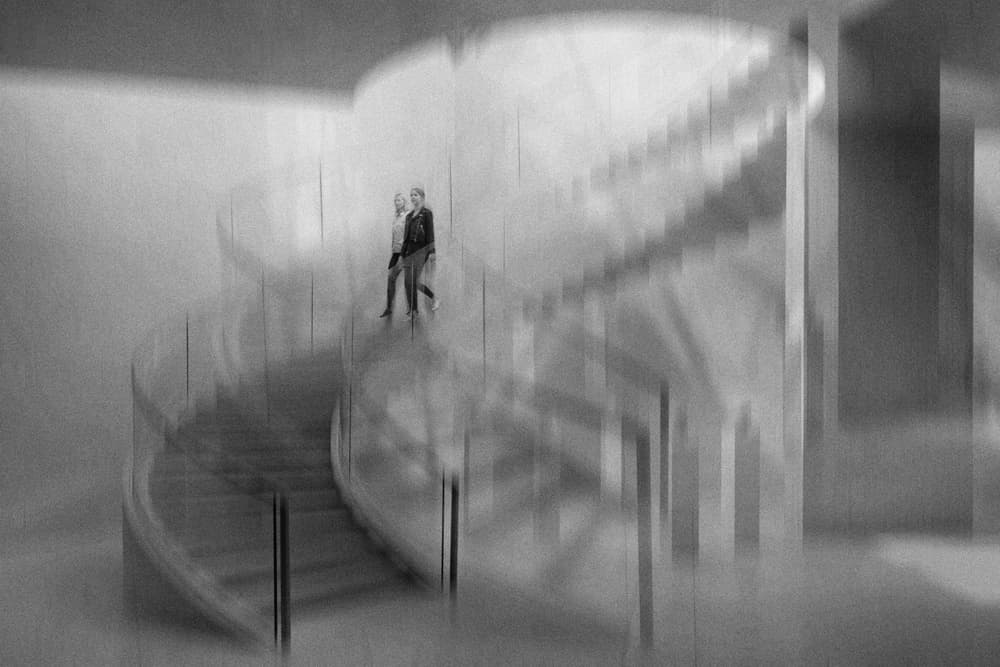 Couple on Spiral Stairs by Jeroen van de Wiel — canvas wall art