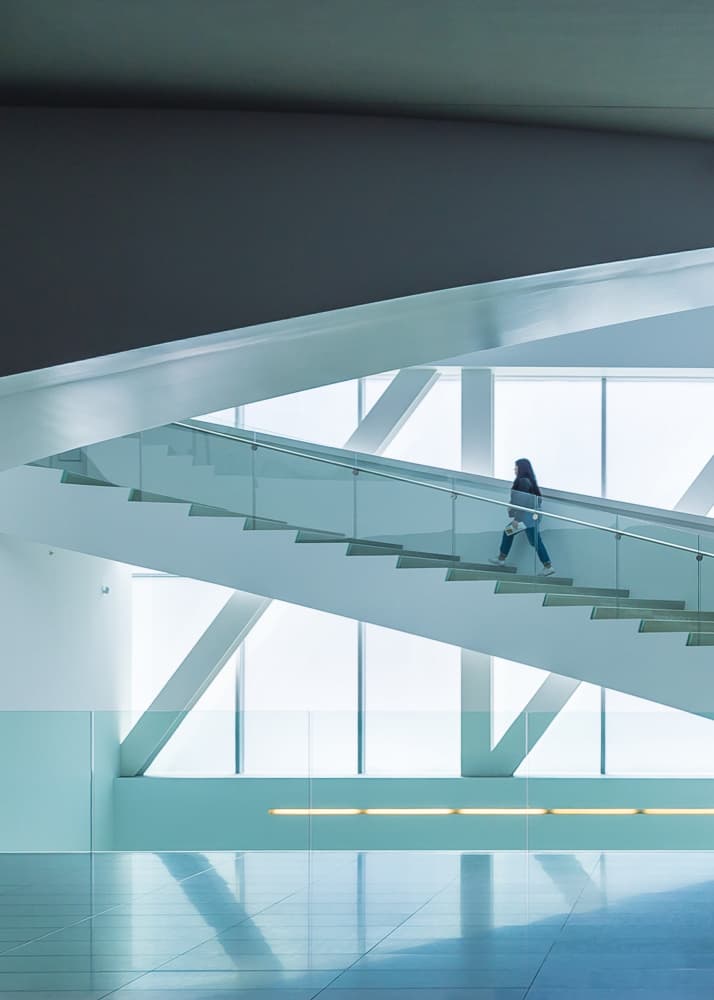 Woman On Modern Staircase by Michiko Ôtomo — canvas wall art