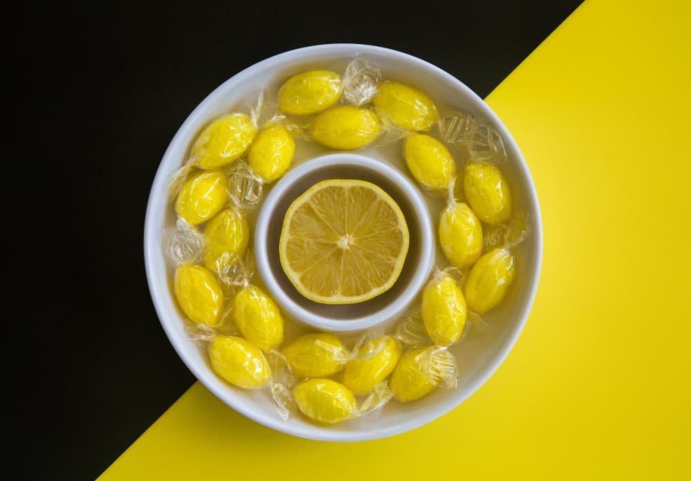 Lemon Yellow Candies by Jacqueline Hammer — canvas wall art