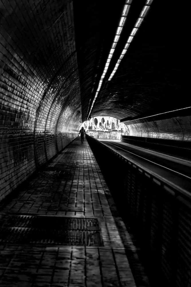 Dark Tunnel Figure by Michel Groleau — canvas wall art