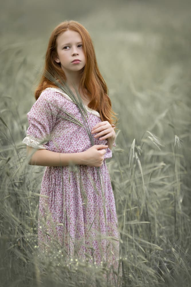 Pensive Redhead In Field by AYMAN KHRBAWE — canvas wall art