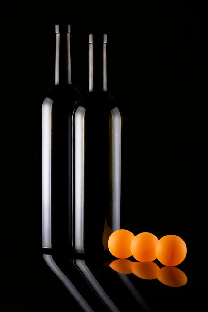 Elegant Bottles Orange Balls by Brig Barkow — canvas wall art