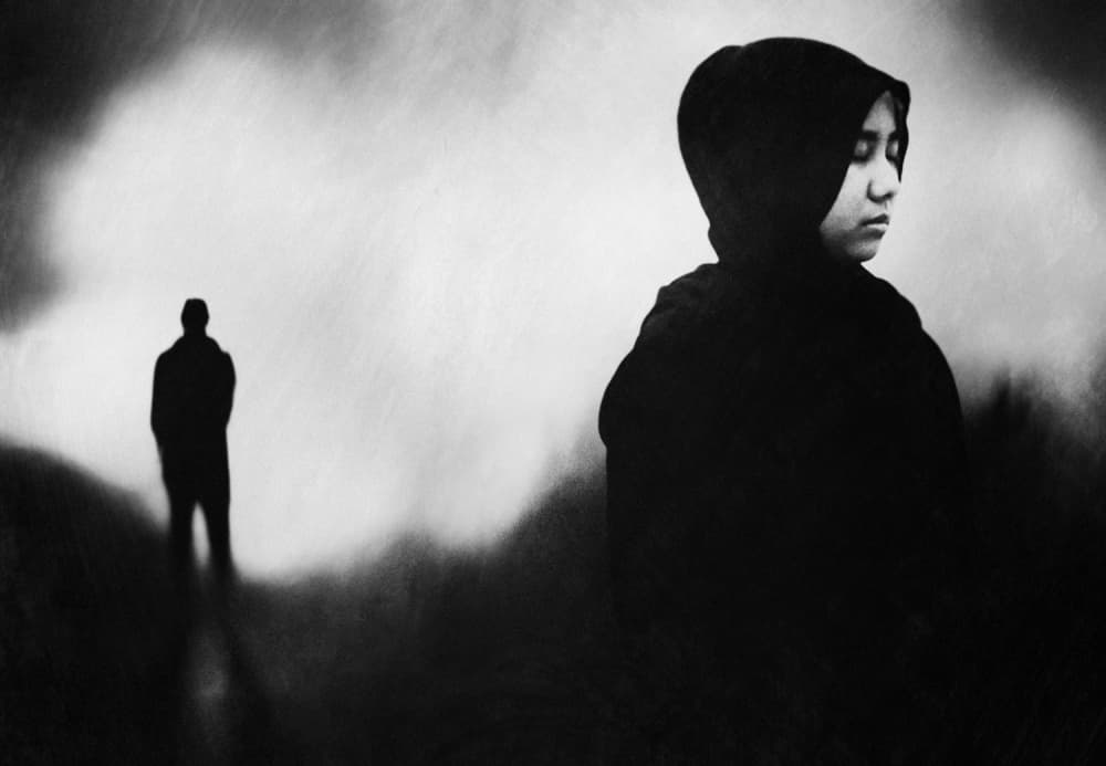 Pensive Woman Distant Man by Jay Satriani — canvas wall art