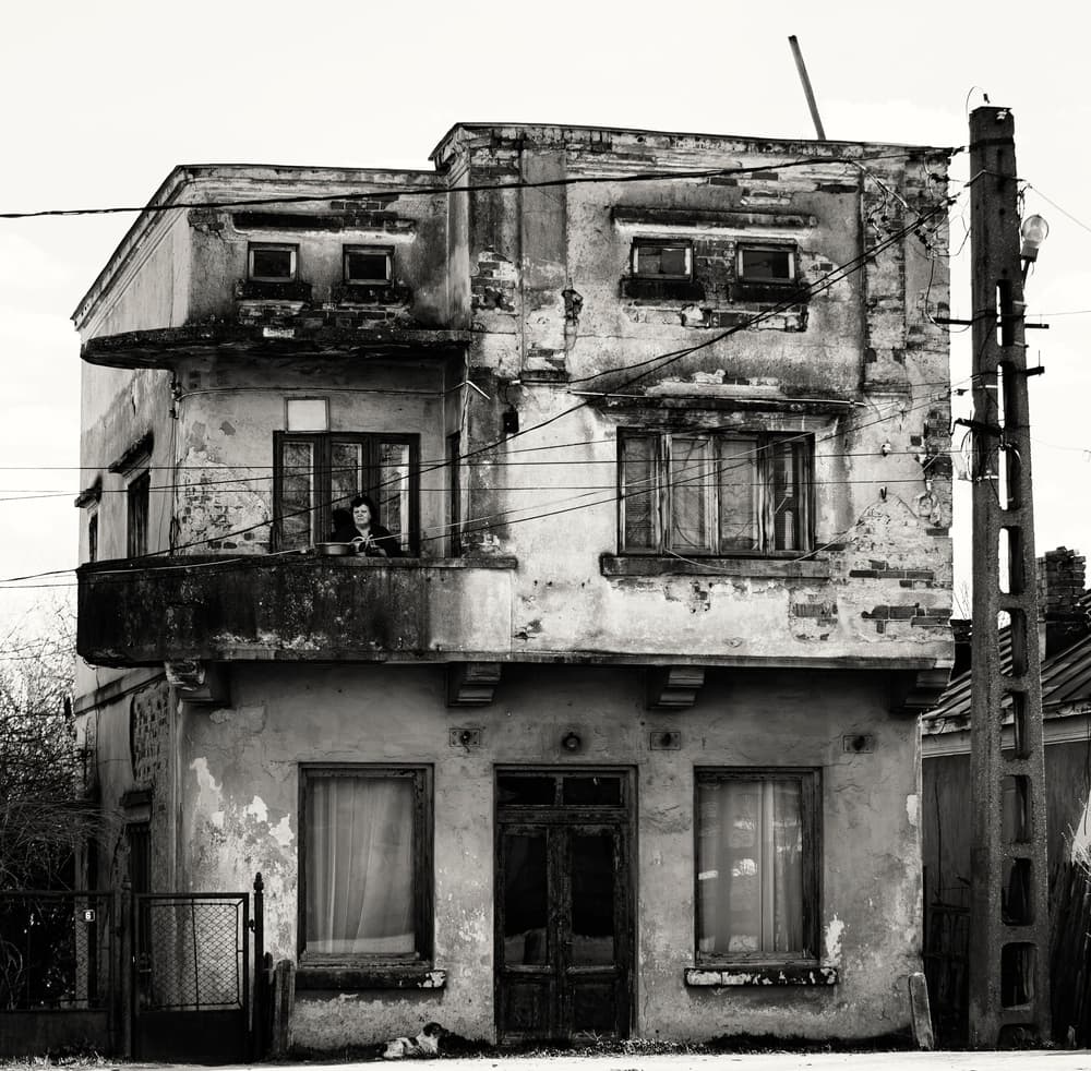 Woman on Weathered Balcony by Julien Oncete — canvas wall art