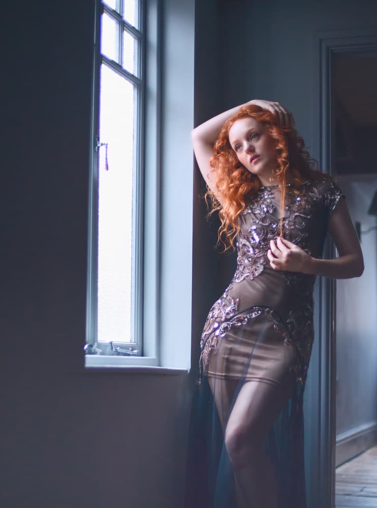 Elegant Redhead Window Portrait by Colin Dixon — canvas wall art