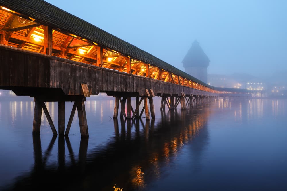 Misty Covered Bridge by Franz Baumann — canvas wall art