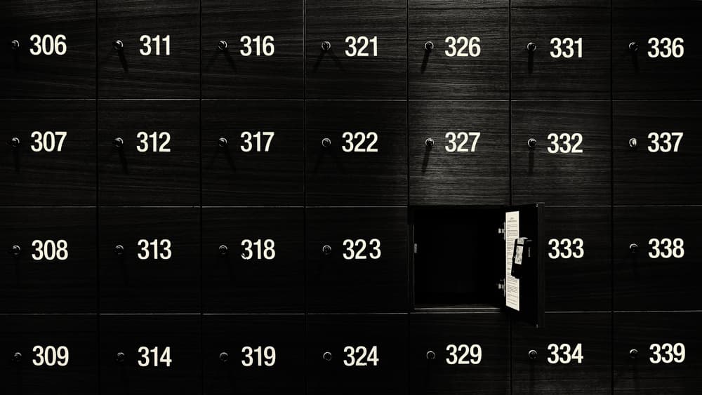 Open Safe Deposit Box by Julien Oncete — canvas wall art