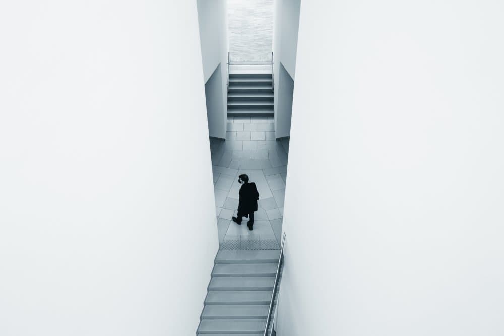 Solitary Figure Downstairs by Kilian CabGuy — canvas wall art