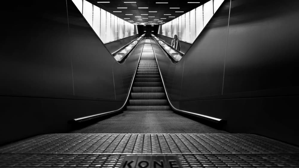 Modern Escalator Descent by Jorge Pimenta — canvas wall art