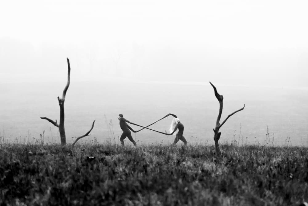 Two Figures Misty Field by Leszek Paradowski — canvas wall art