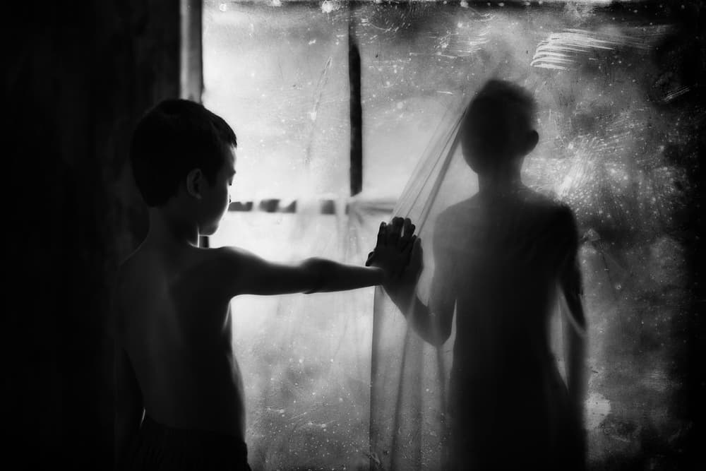 Boy Touching Reflection by Hari Sulistiawan — canvas wall art