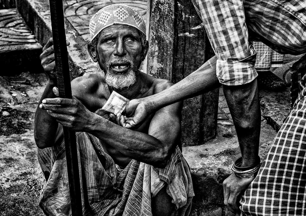 Street Donation Moment by Joxe Inazio Kuesta Garmendia — canvas wall art